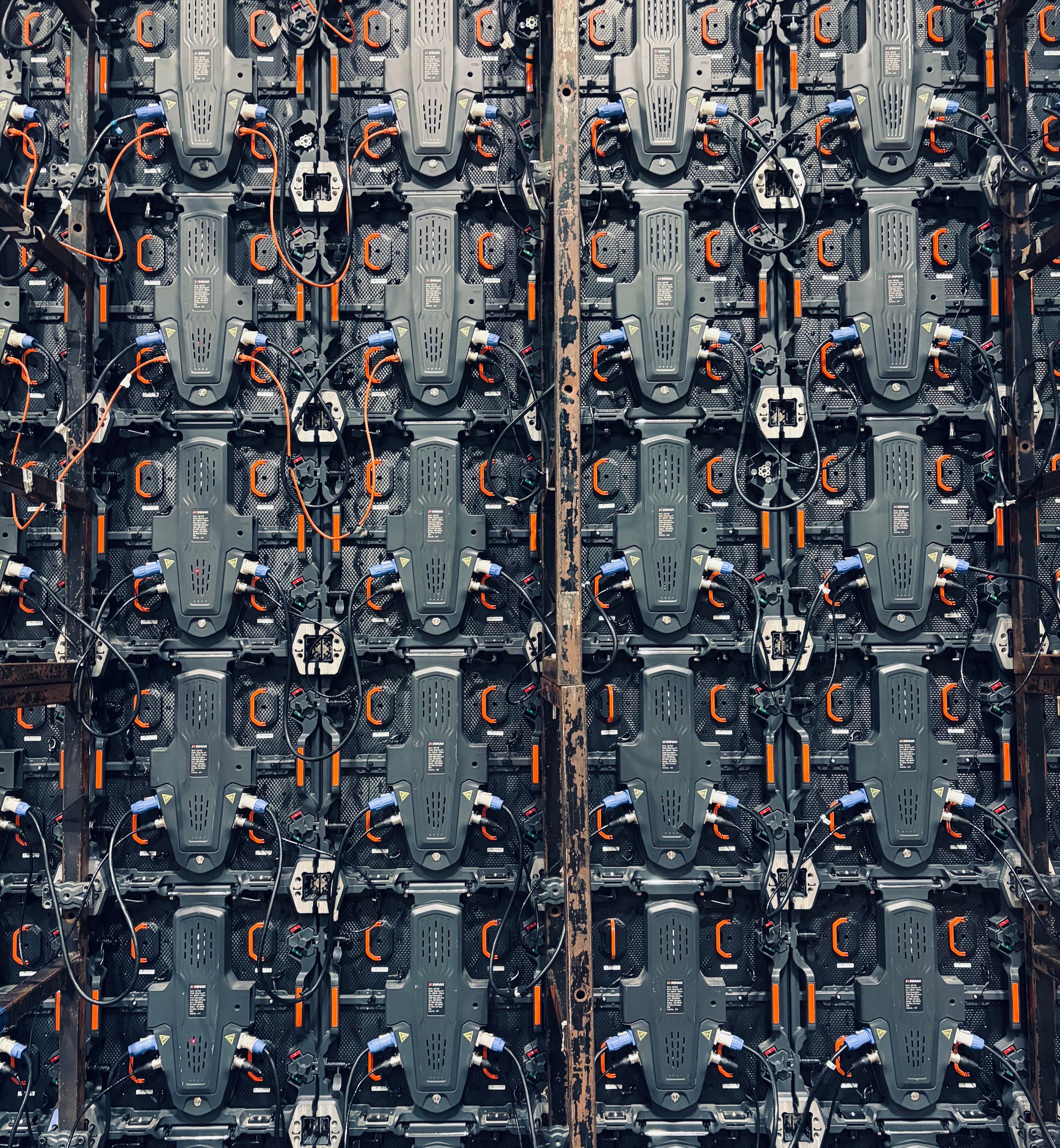 Rack of battery storage modules at an energy storage facility