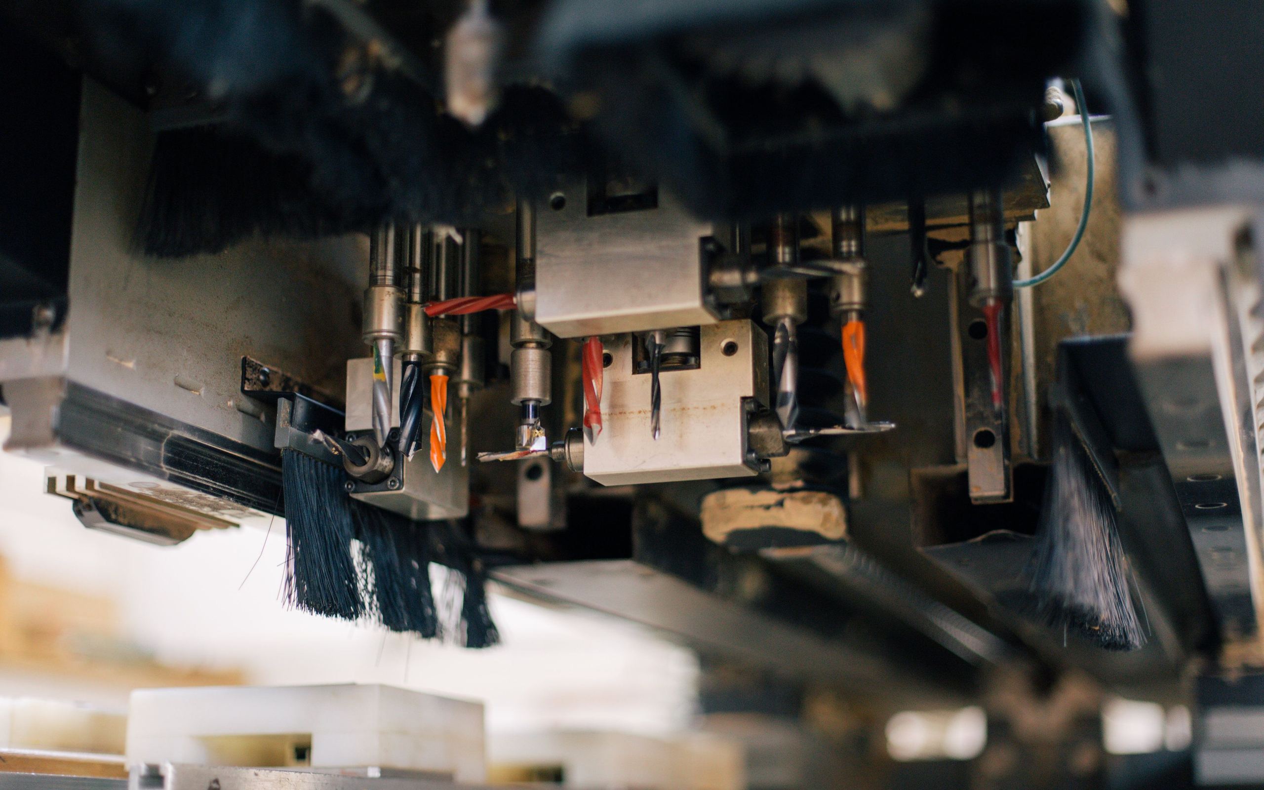 Tooling and guide pillars under an industrial press