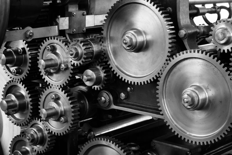 Meshed gears and chain drive on industrial machinery