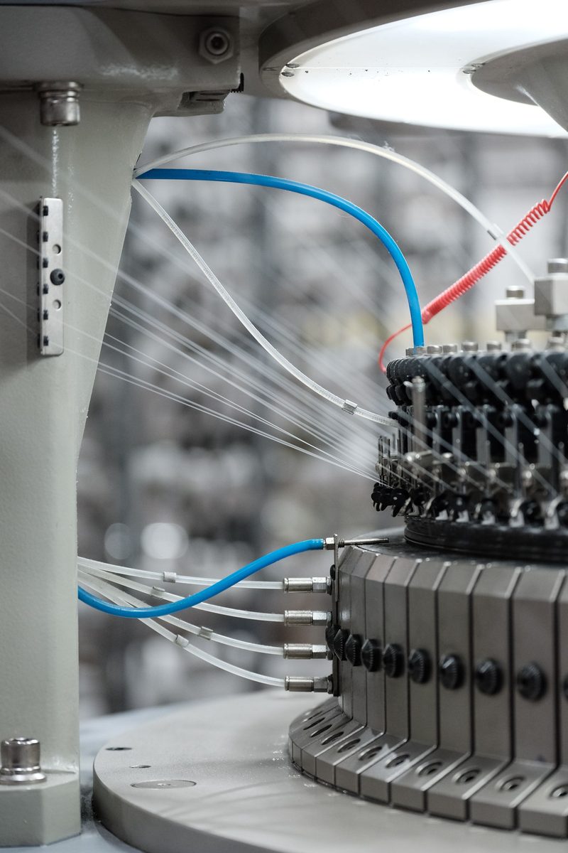 Continuous filament running through a fibre processing machine